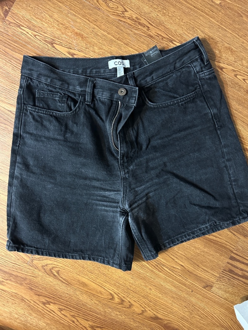 COS black denim shorts